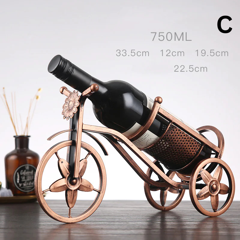 Elegant Porte-Bouteille RoyalCar wine holder in a vintage carriage design, crafted from durable metal in bronze finish, showcasing a wine bottle.