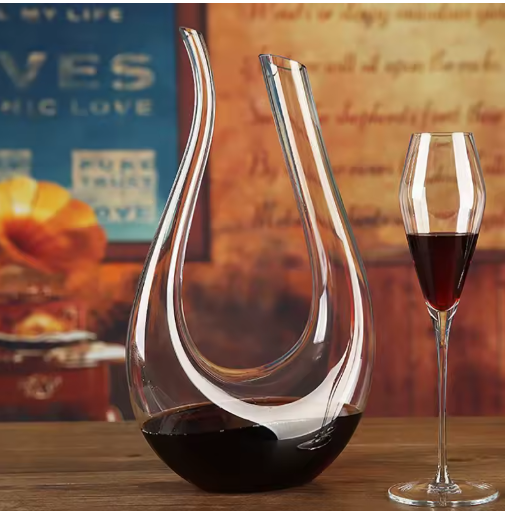 Luxe crystal wine carafe with red wine, U-shaped design, 1500ml capacity.